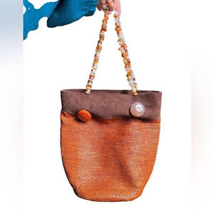 Angelica Morina original designs woven beaded beach purse